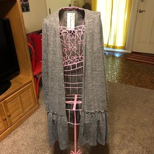 Light weight cardigan with ruffle bottom